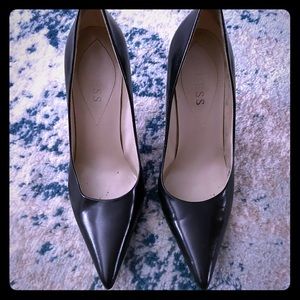 Black leather pointy toe heels